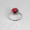 “Forever" Engagement Ring in18ct white gold set with an oval ruby and side diamonds
