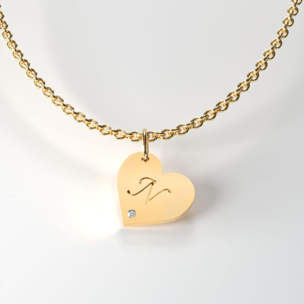 Gold heart Shaped tag, with diamond. Available in 9,14 and 18 Carats