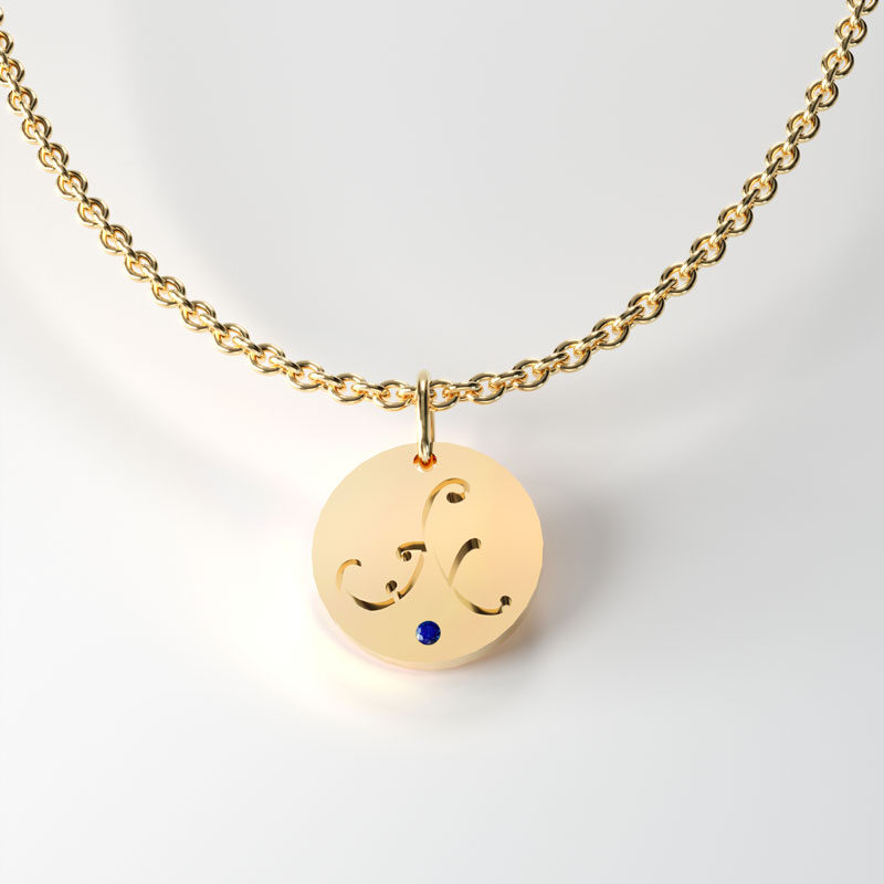 Gold round Shaped tag, with sapphire. Available in 9,14 and 18 Carats