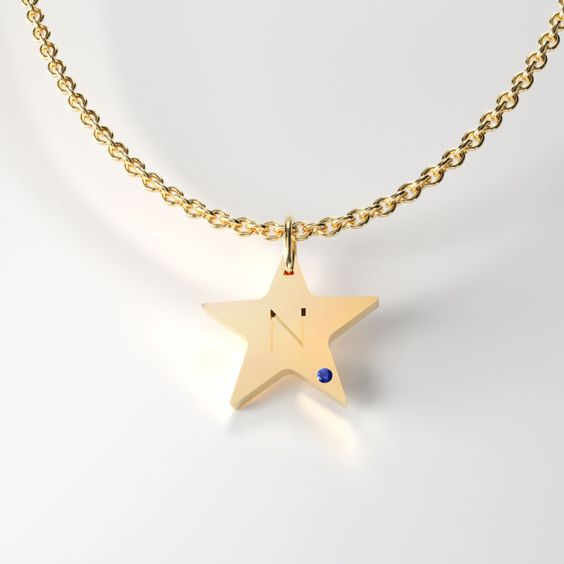 Gold Star Shaped tag, with sapphire. Available in 9,14 and 18 Carats